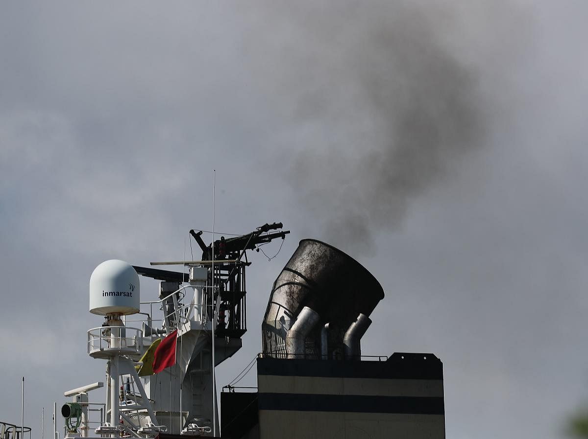 Smoke is seen pouring from the smokestack on a container ship. Trump administration officially withdraws from the Pairs Climate Agreement according to a 2017 EPA study the largest source of greenhouse gas emissions in the United States is from the transportation sector. (AFP Photo)