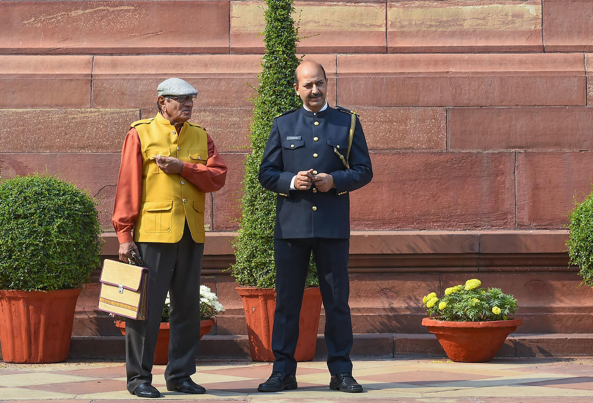 A marshal in the new uniform at Parliament during its ongoing Winter Session, in New Delhi, Tuesday, Nov 19, 2019. Earlier the 'Marshals' used to wear the ‘bandhgalas’ during the winter along with turbans. (PTI Photo)