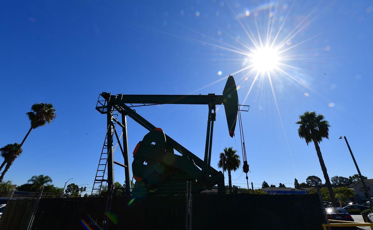 In this file photo taken on October 21, 2019, pumpjack from California-based energy company Signal Hill Petroleum is seen in Signal Hill, California. (AFP Photo)