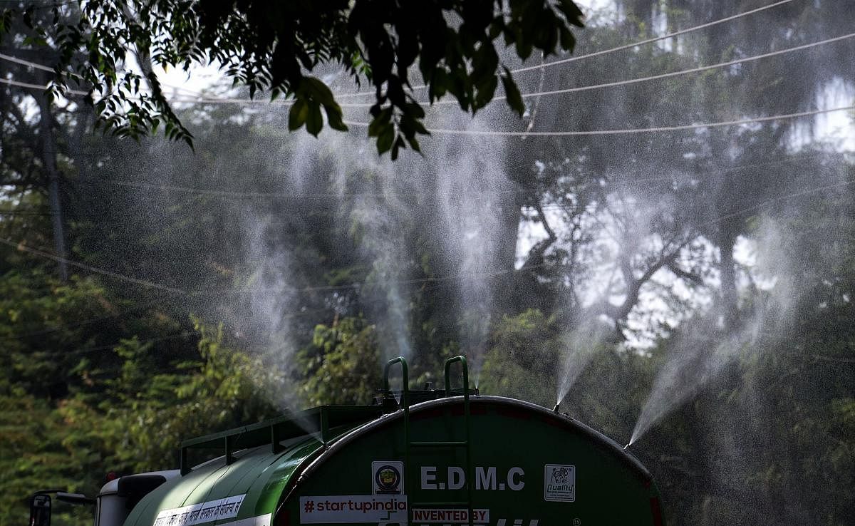 Water being sprayed from an 'anti-smog gun', a machine that sprays atomised water into the air to reduce pollution, at East Delhi. (PTI file photo)