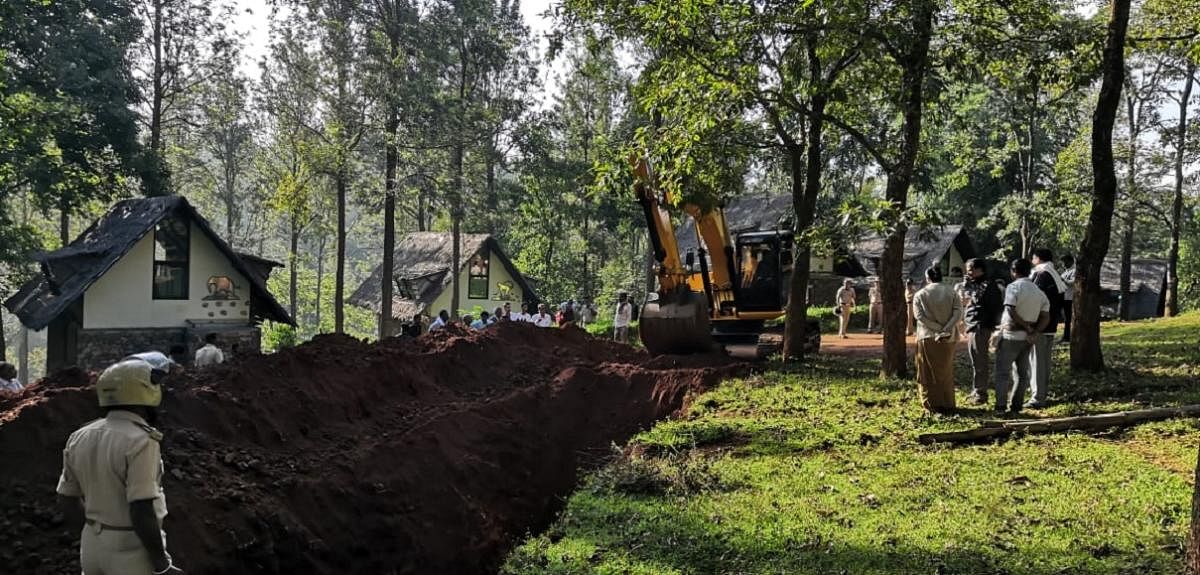 Trench dug up around the disputed land, at BR Hills, Yalandur, Chamarajanagar district.