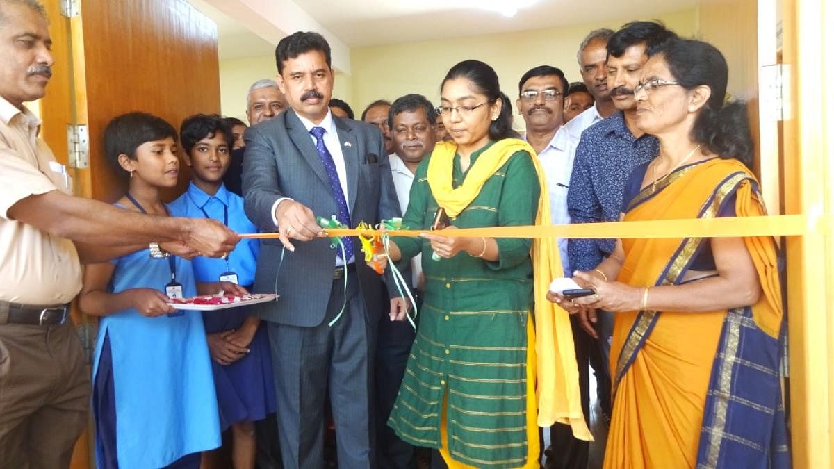 Kodagu Zilla Panchayat CEO K Lakshmi Priya inaugurates the newly built classroom by BEL in Madikeri.