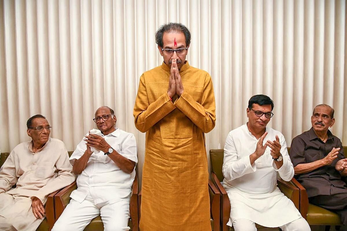 Mumbai: Shiv Sena President Uddhav Thackeray gestures after he was chosen as the nominee for Maharashtra chief minister's post by Shiv Sena-NCP-Congress alliance, during a meeting in Mumbai, Tuesday, Nov. 26, 2019. NCP chief Sharad Pawar and other leaders