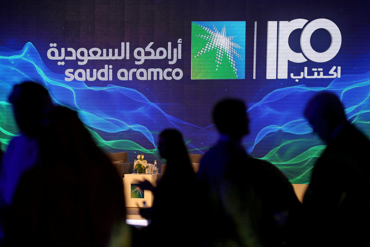 A sign of Saudi Aramco's initial public offering (IPO) is seen during a news conference by the state oil company at the Plaza Conference Center in Dhahran, Saudi Arabia. (Reuters Photo)