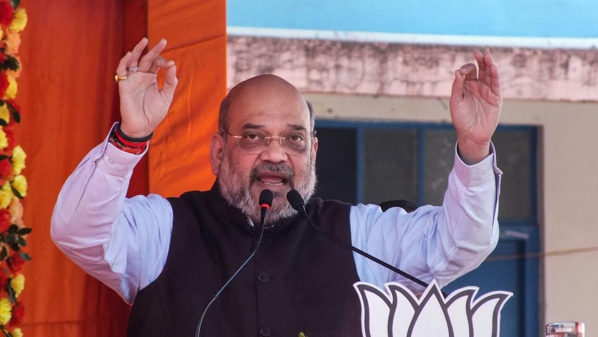 Union Home Minister Amit Shah addresses an election campaign ahead of Jharkhand Assembly Elections, in Manika area of Latehar district, Thursday, Nov. 21, 2019. (PTI Photo)