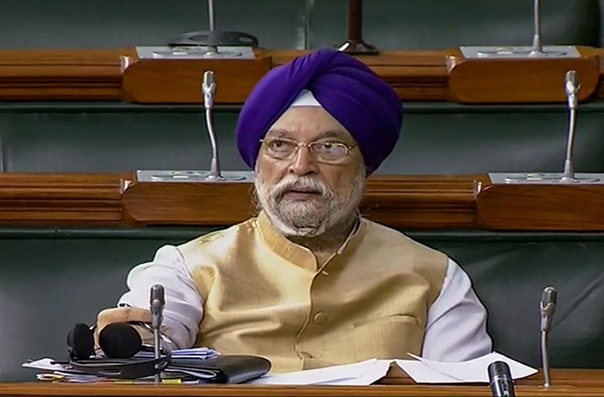 Union Minister Hardeep Singh Puri in the Lok Sabha during the Winter Session of Parliament. (PTI Photo)