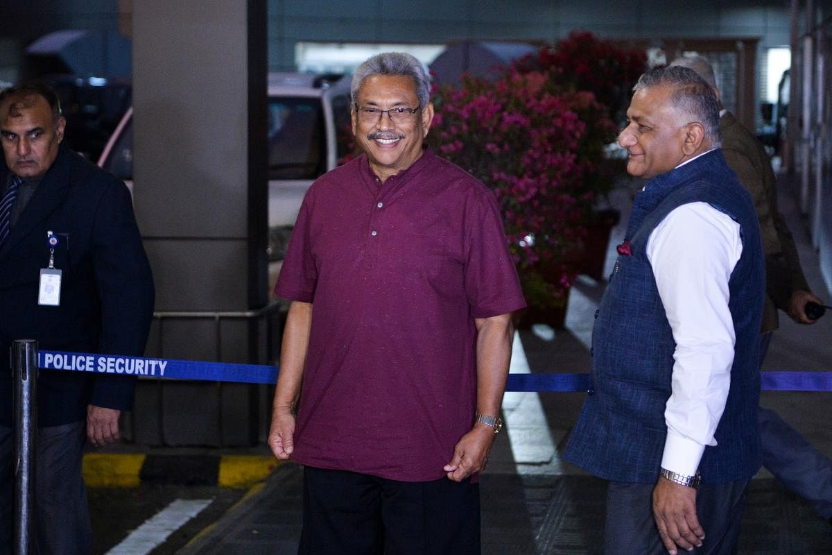 Sri Lanka's President Gotabaya Rajapaksa (C) arrives at the Indra Gandhi International airport in New Delhi. AFP