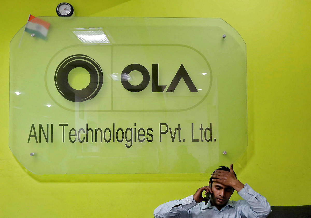 An Ola spokesperson said the company's "organisational redesign aims to rightsize all our operations as well as leverage skills sets and experience of mobility employees in available positions in new business verticals". (Photo by Reuters)