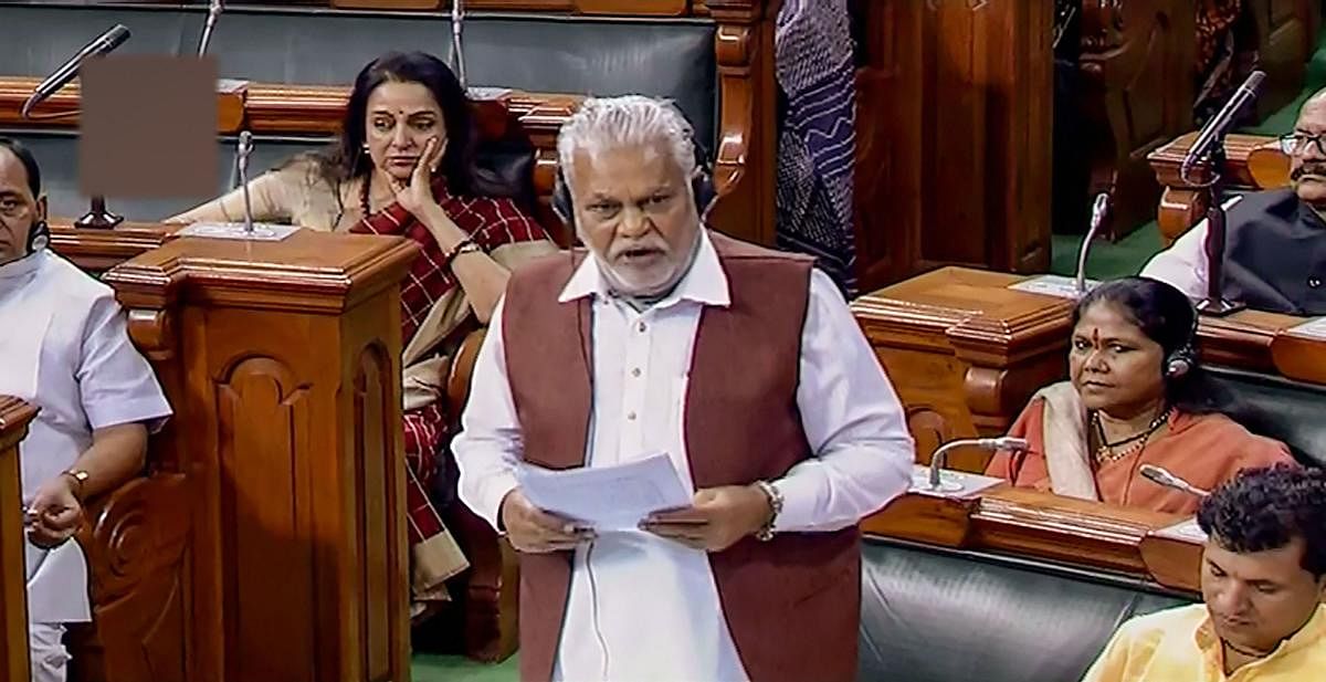Minister of State for Panchayati Raj Parshottam Rupala speaks in the Lok Sabha during the Winter Session of Parliament. PTI Photo