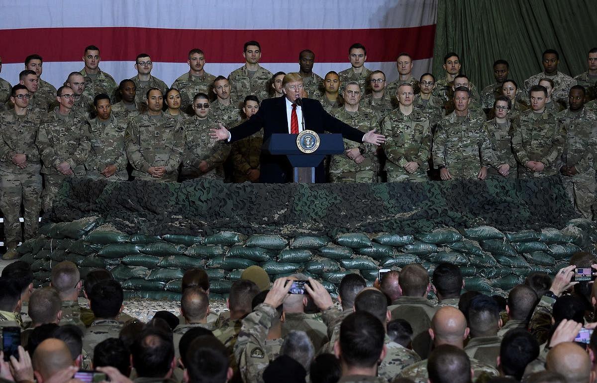 US President Donald Trump speaks to the troops. Photo by AFP