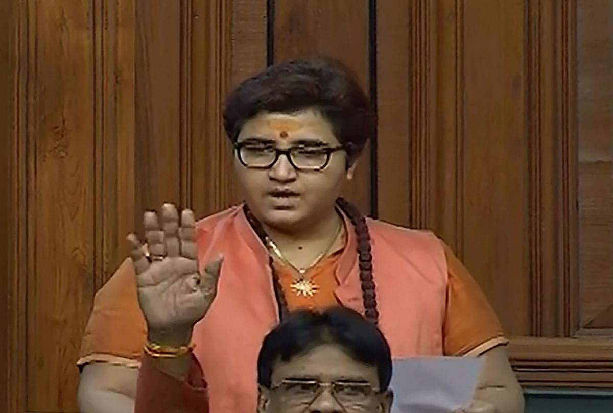 Amid sloganeering by Opposition members, Pragya, the Lok Sabha member from Bhopal, claimed that her remarks were “twisted” and later hit back at the Congress by submitting a breach of privilege notice against Rahul Gandhi for calling her a terrorist. Photo/PTI