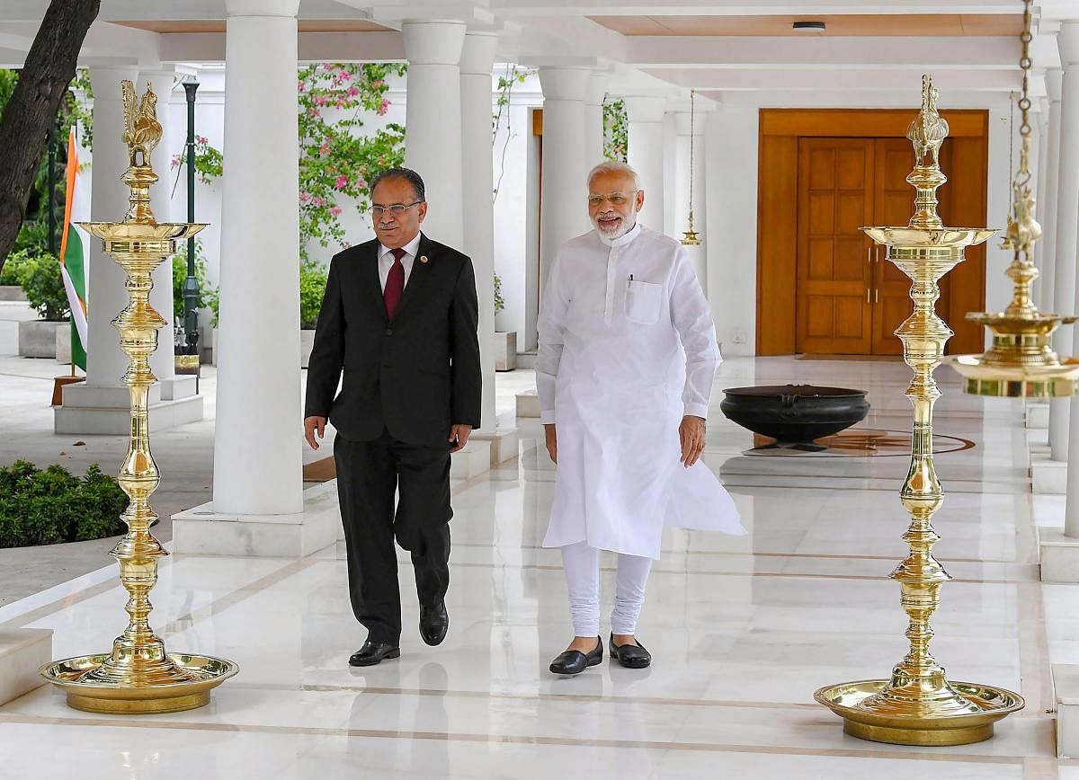 Former Nepal Prime Minister Pushpa Kamal Dahal and Indian PM Narendra Modi(PTI Photo)