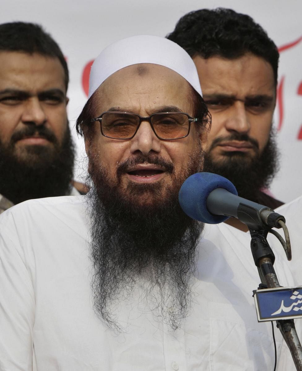 Hafiz Saeed, founder of Pakistani religious group Jamaat-ud-Dawa addresses an anti-Indian rally in Lahore, Pakistan. Pakistani authorities say they have arrested Saeed, a radical cleric and U.S.-wanted terror suspect blamed for the 2008 Mumbai attacks. (P