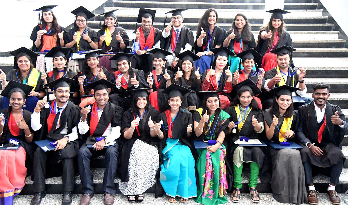 Toppers and gold medallists at the third convocation of the Dayananda Sagar University on Saturday. DH PHOTO/SRIKANTA SHARMA R