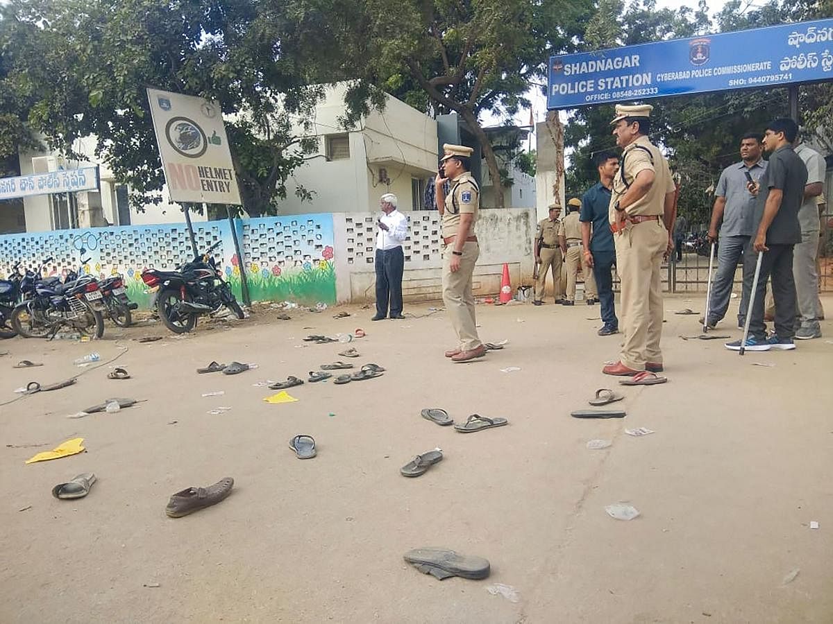 Footwear's lie on the road after clashes between protestors and police during a demonstration demanding justice for P Priyanka Reddy, who was working as an assistant veterinarian at a state-run hospital and whose charred remains was found under a culvert,  in Hyderabad, Saturday, Nov. 30, 2019. (PTI Photo)