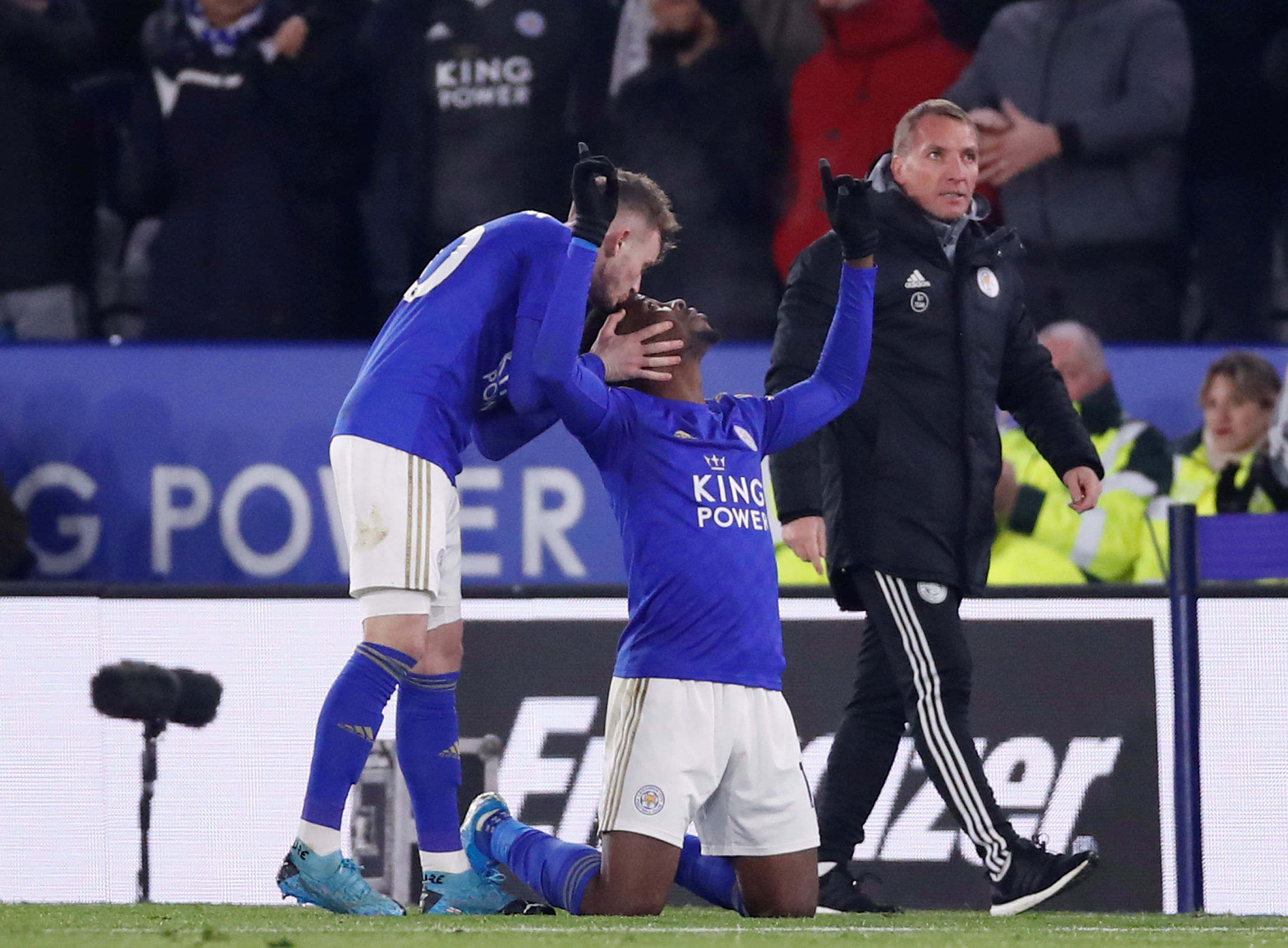 Leicester City's Kelechi Iheanacho celebrates scoring their second goal with James Maddison and manager Brendan Rodgers. (Reuters Photo)