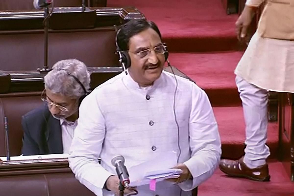Union HRD Minister Ramesh Pokhriyal speaks in the Rajya Sabha during the ongoing Winter Session of Parliament, in New Delhi, Thursday, Nov. 21, 2019. (PTI Photo)