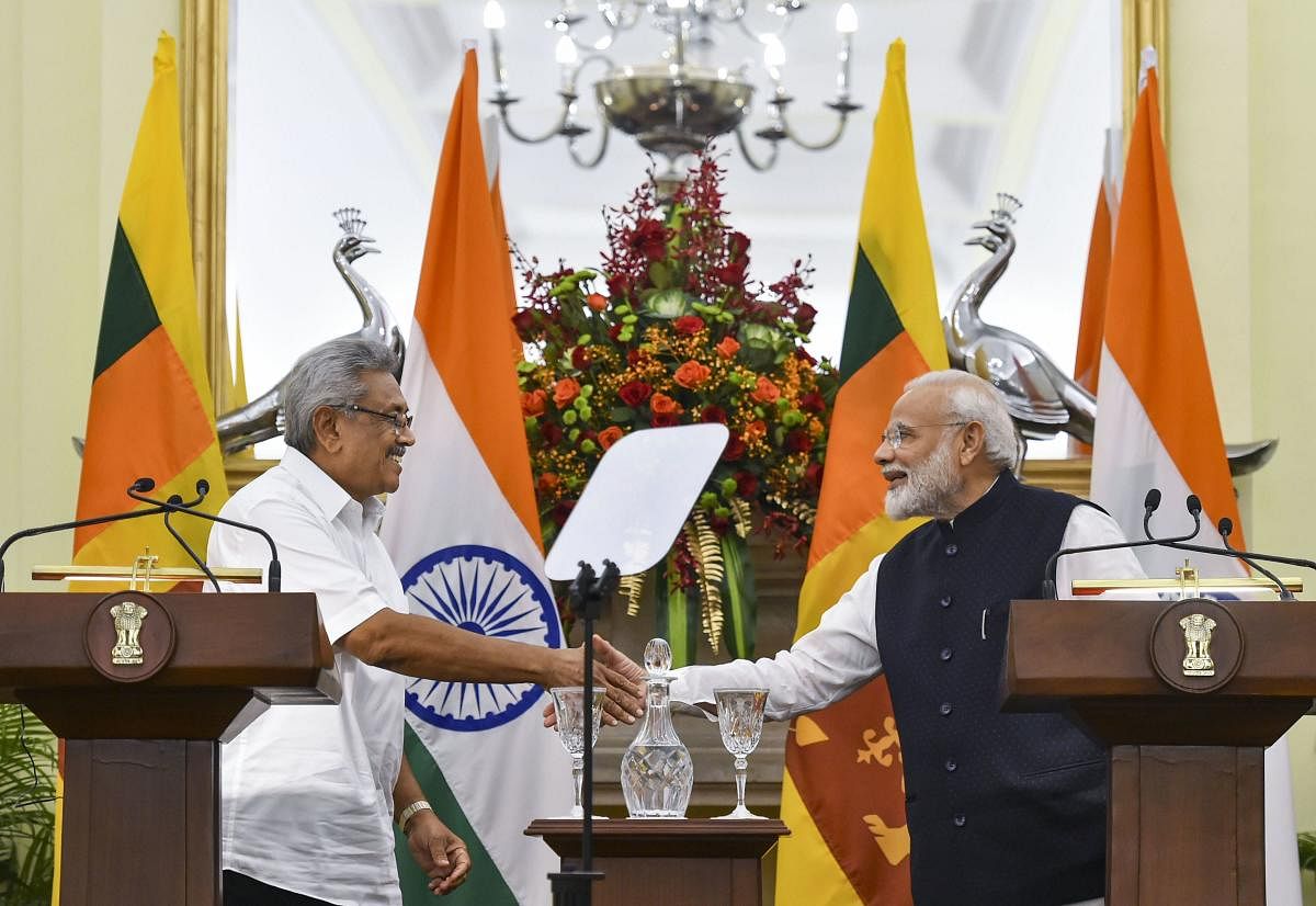  Prime Minister Narendra Modi shakes hands with Sri Lankan President Gotabaya Rajapaksa. PTI Photo