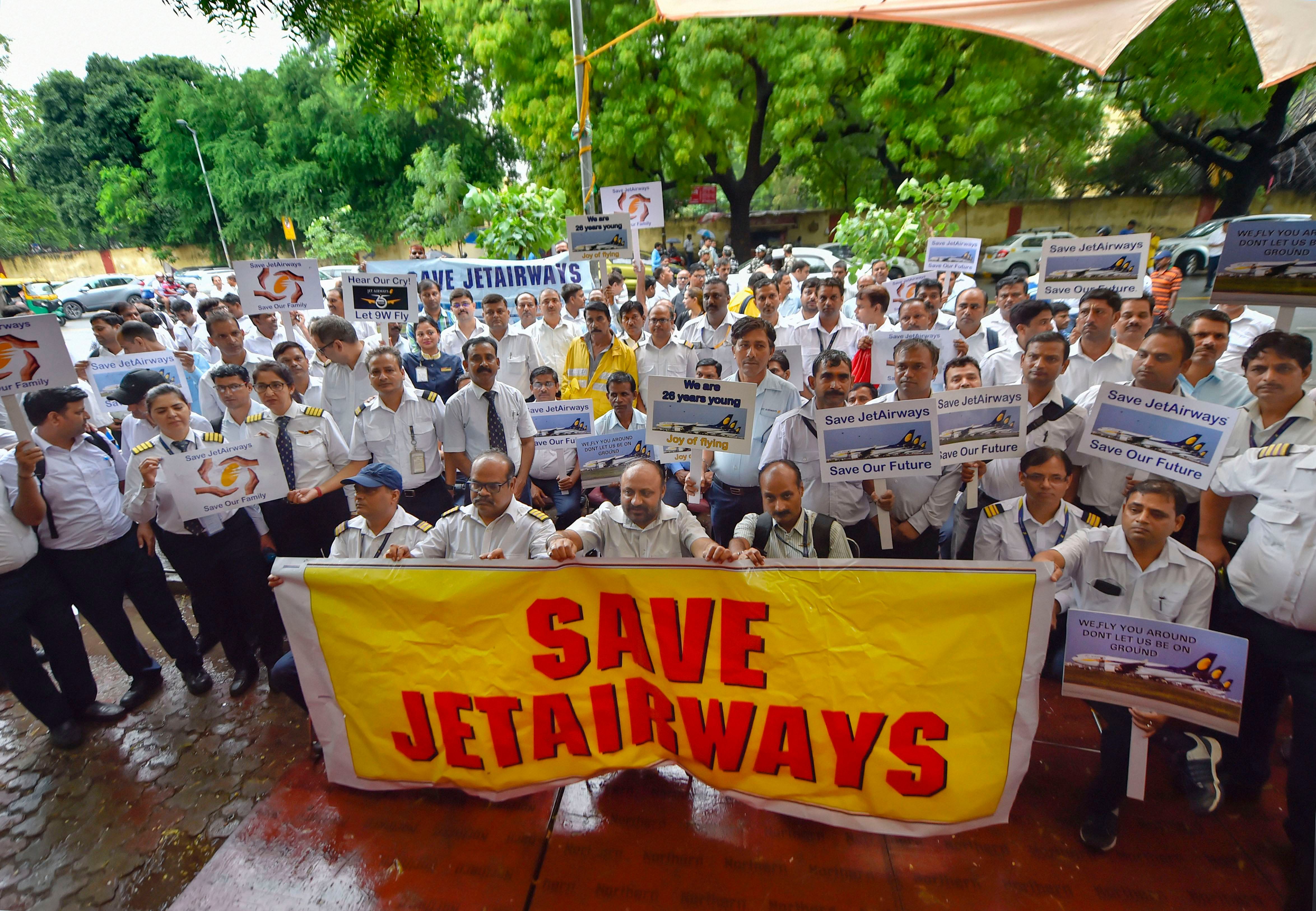 Jet Airways employees stage a protest at Jantar Mantar, in New Delhi. (PTI Photo)