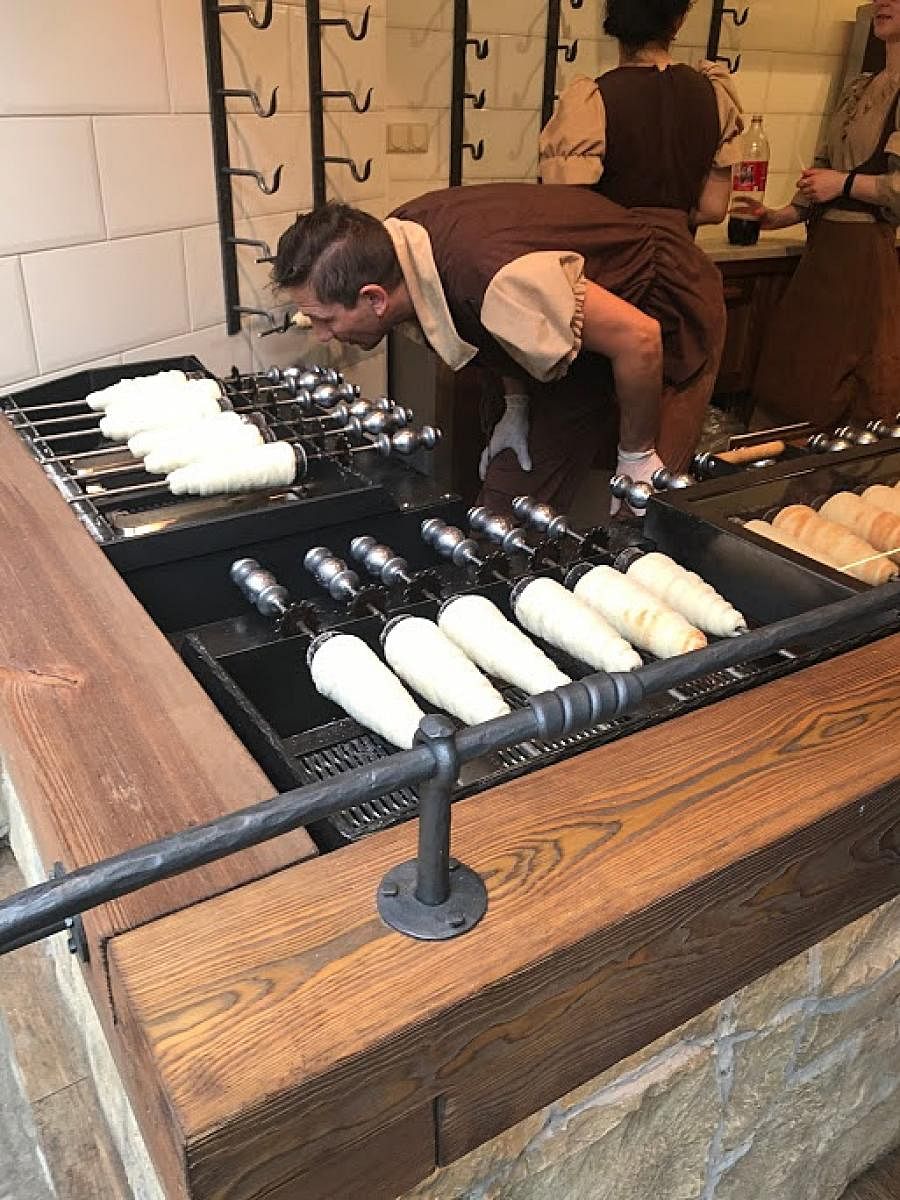A batch of chimney cakes being prepared in Budapest. PHOTOS BY AUITHOR