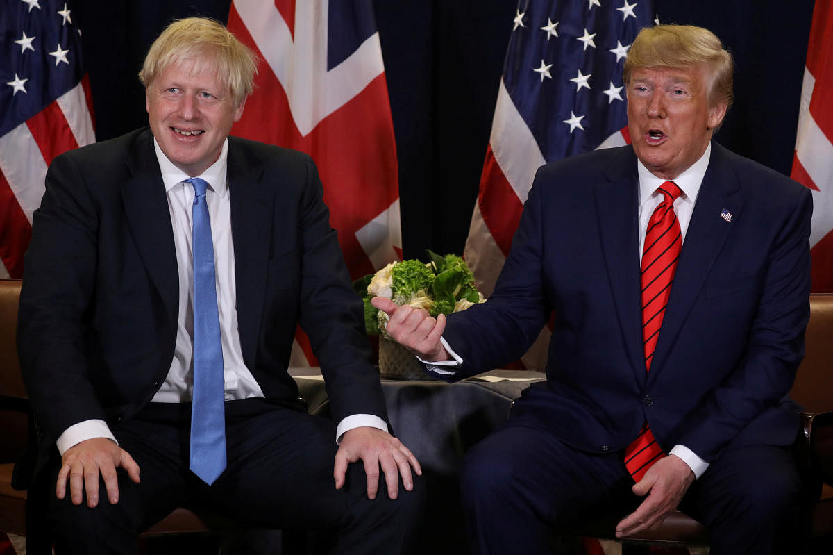 US President Donald Trump said on Tuesday he would meet British Prime Minister Boris Johnson but promised to "stay out" of Britain's election campaign during his two-day visit. Photo/REUTERS