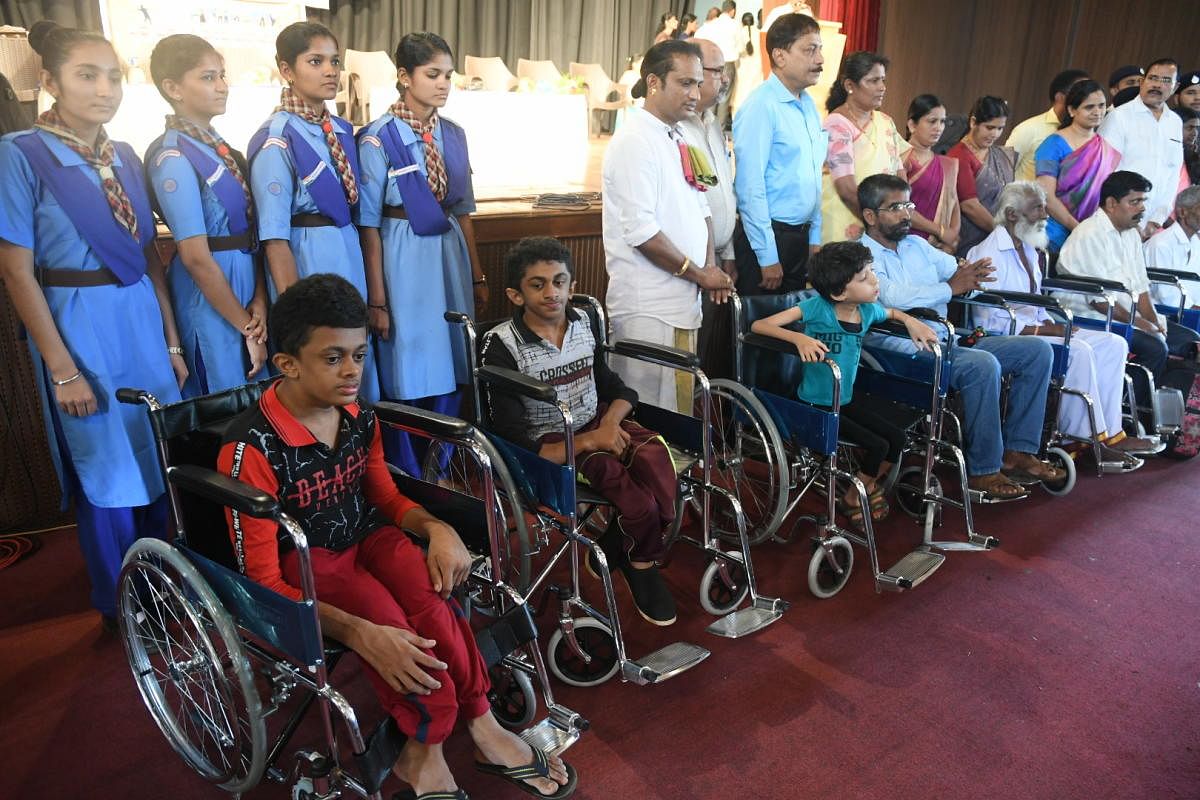 Wheelchairs were distributed to the differently abled at the International Day of Disabled Persons programme at Town Hall in Mangaluru on Tuesday.