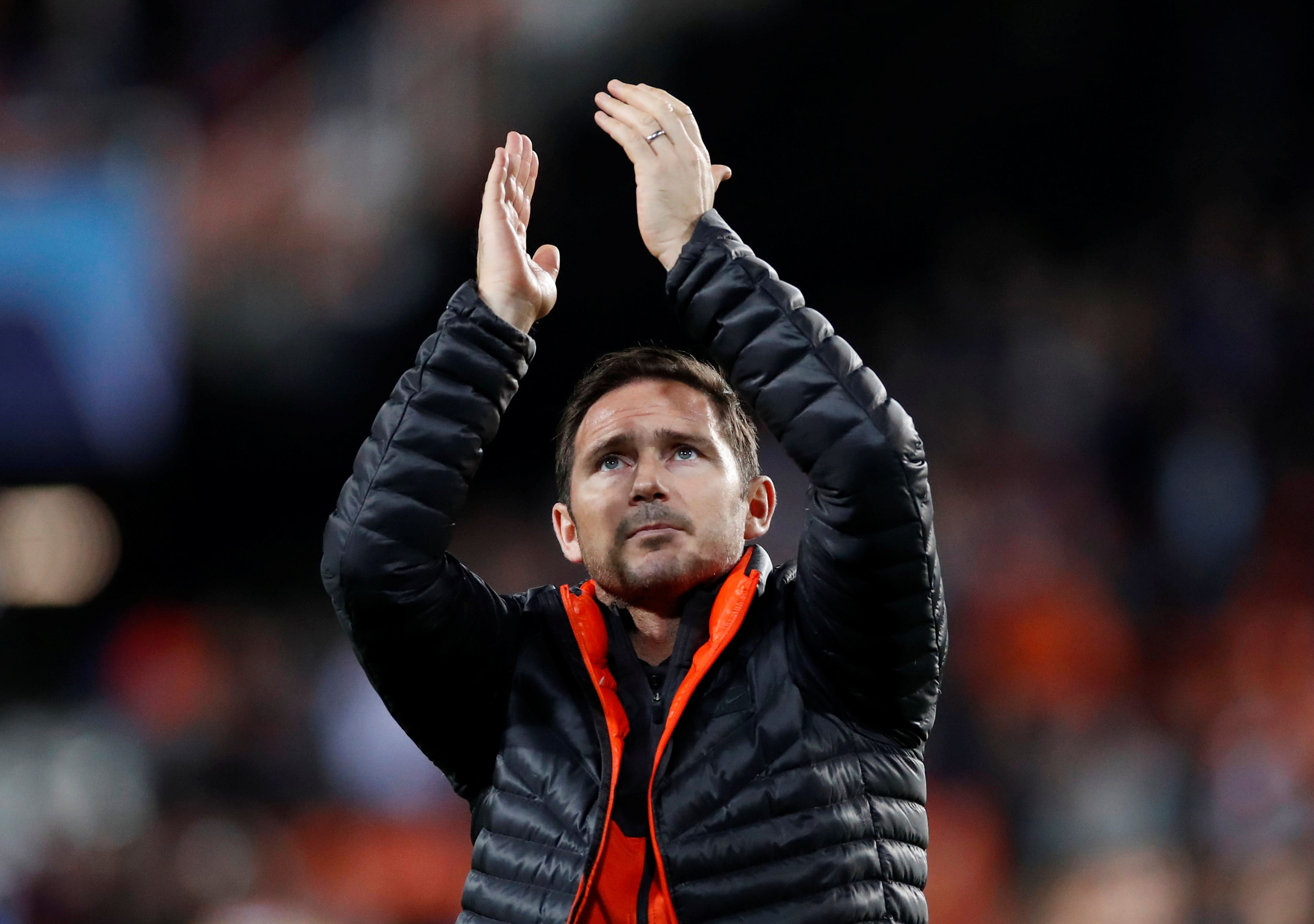 Chelsea manager Frank Lampard applauds fans after the match. (Reuters Photo)