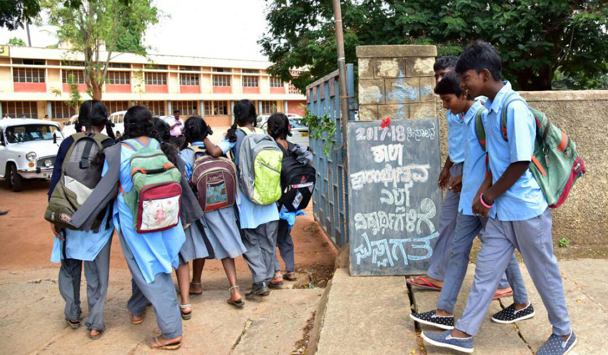 HMT Higher Kannada Primary School children are come to school on 1 st day, after the Summer vacation, schools are re-opened on Monday, in Bengaluru. Photo/ B H ShivakumarThe department of public instruction conducted various campaigns in the beginning of
