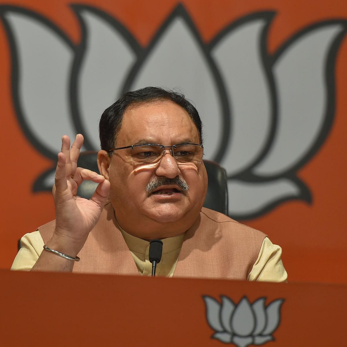 "Now the two parties have joined hands as they want the kursi' (cm chair). They can't remain without power, and you should keep them out of power for the development of Jharkhand," Nadda exhorted the voters. (PTI Photo)