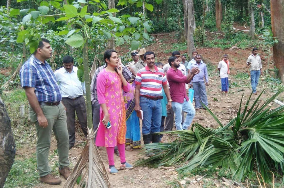 Deputy Commissioner Annies Kanmani Joy visits the site earmarked for rehabilitation of flood victims in Abhyath Mangala village in Kodagu.