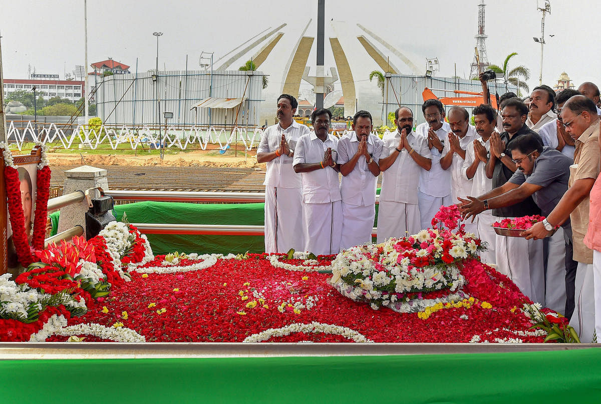 AIADMK party workers and leaders pay tribute to former chief minister, the late J Jayalalithaa on her third death anniversary, in Chennai. (PTI Photo)