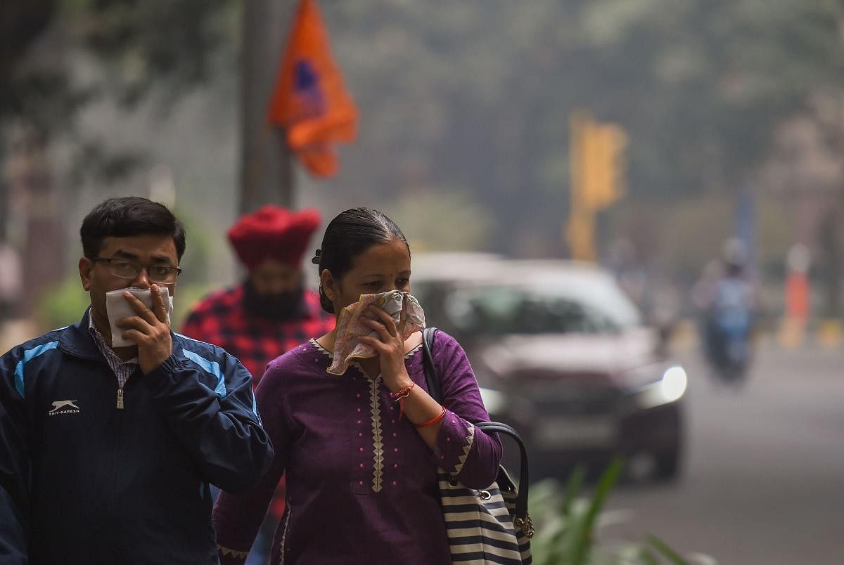 Residents try to escape the ill effects of "very poor" air quality in Delhi, which crossed the 300 mark on Thursday.