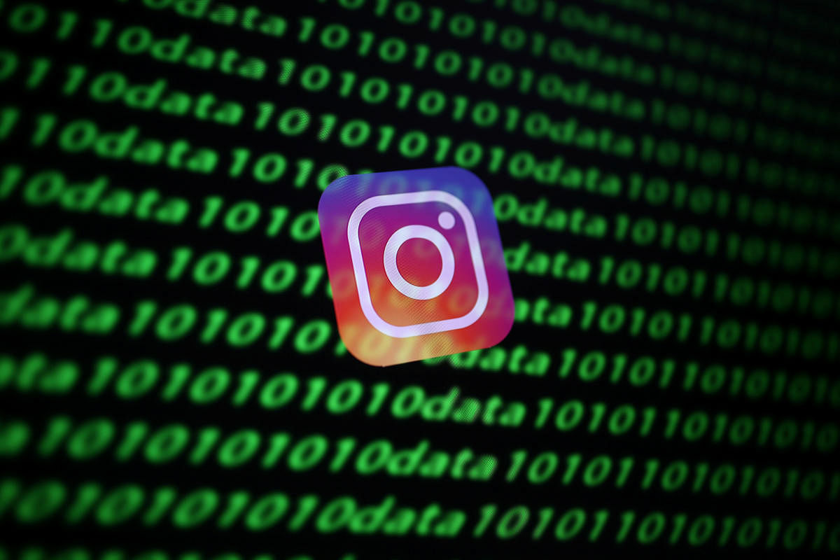 The Instagram logo and binary cyber codes are seen in this illustration taken November 26, 2019. (Reuters Photo)