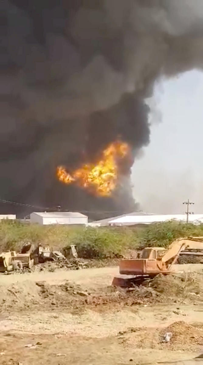 Smoke rises following a ceramics factory explosion in Khartoum, Sudan December 3, 2019