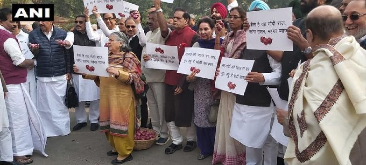 Congress leaders P Chidambaram, who is out on bail after 106 days in jail, Adhir Chowdhury, Gaurav Gogoi and others protested at the Parliament premises on Thursday against rising onion prices. Photo (Twitter/@ANI)