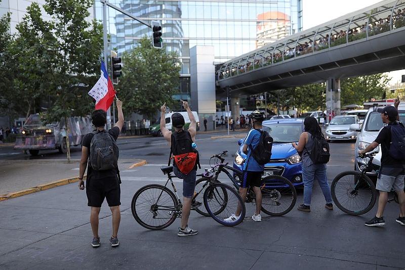 emonstrators using their bikes block a street during a protest in Santiago, Chile. (Reuters Photo)