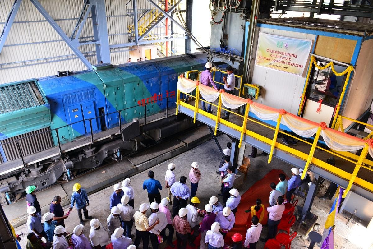 A view of commissioning of pet-coke wagon loading system at Thokur Railway Station.