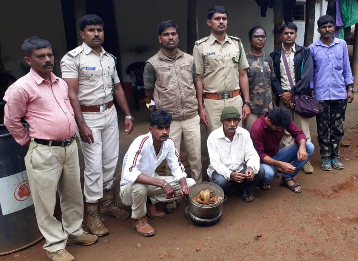 Three men, who poached a wild boar, were arrested by Forest department personnel.