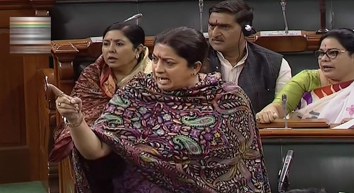 Woman and Child Welfare Minister Smriti Irani speaks in the Lok Sabha during the Winter Session of Parliament, in New Delhi, Friday, Dec. 6, 2019. (PTI Photo)