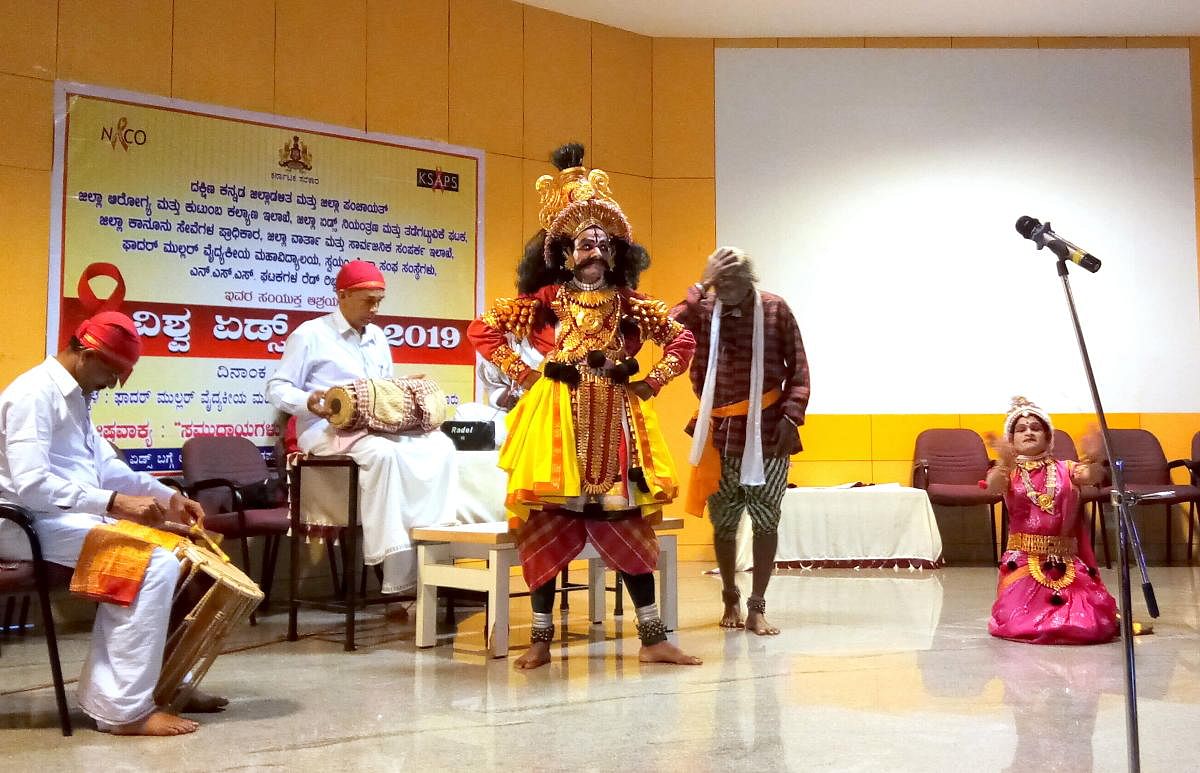Artistes from Shambhulingeshwara Yakshagana Mandali, Sirsi, perform a Yakshagana play to create awareness on HIV/AIDS.
