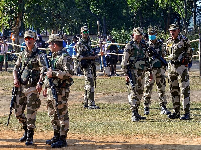 Para-military personnel deployed near polling booth areas ahead of the second phase of Jharkhand Assembly elections scheduled. (PTI Photo)