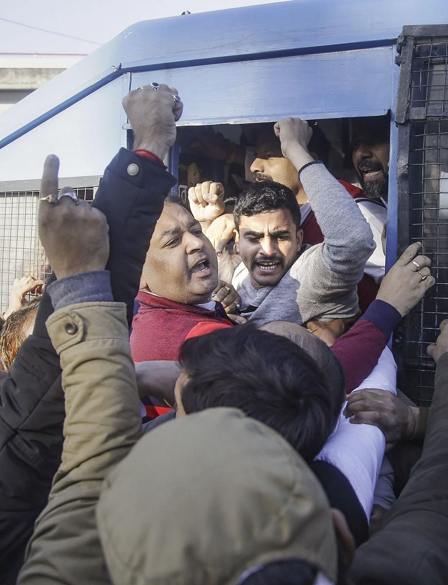 Police detain activists of Jammu and Kashmir National Panthers Party (JKNPP) during a bandh call given by them against suspension of mobile Internet services following abrogation of Article 370 provisions and against setting up of toll plaza at Sarore on the Jammu-Pathankot highway. PTI
