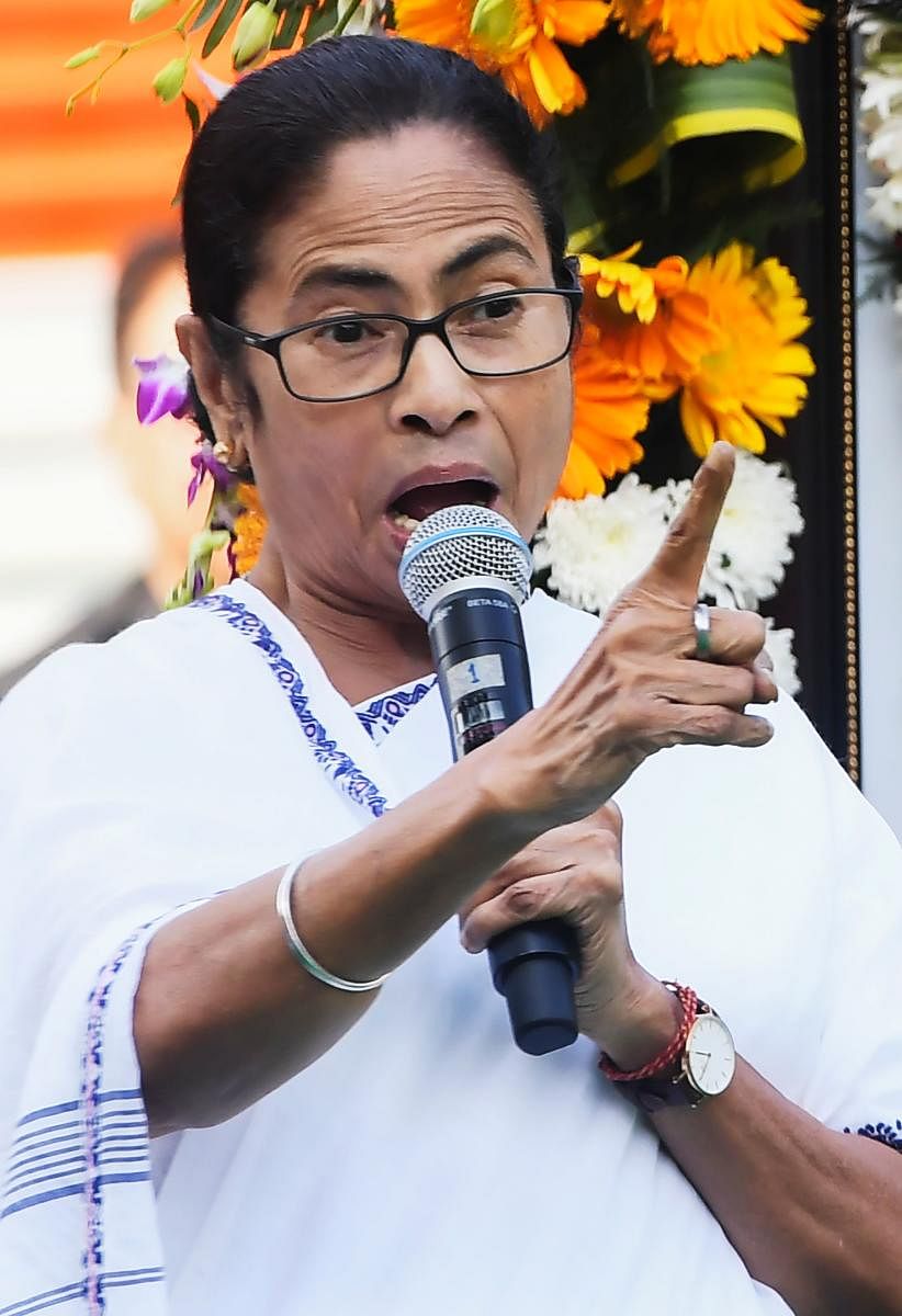Chief minister of West Bengal state and leader of the Trinamool Congress (TMC) Mamata Banerjee gestures as she delivers a speech during a solidarity meeting in Kolkata on December 6, 2019. (AFP Photo)