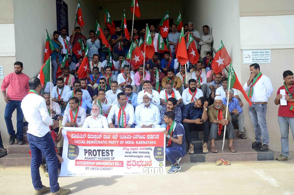 Members of SDPI staged a protest against the Citizenship Amendment Bill, in front of the DC’s office in Madikeri.