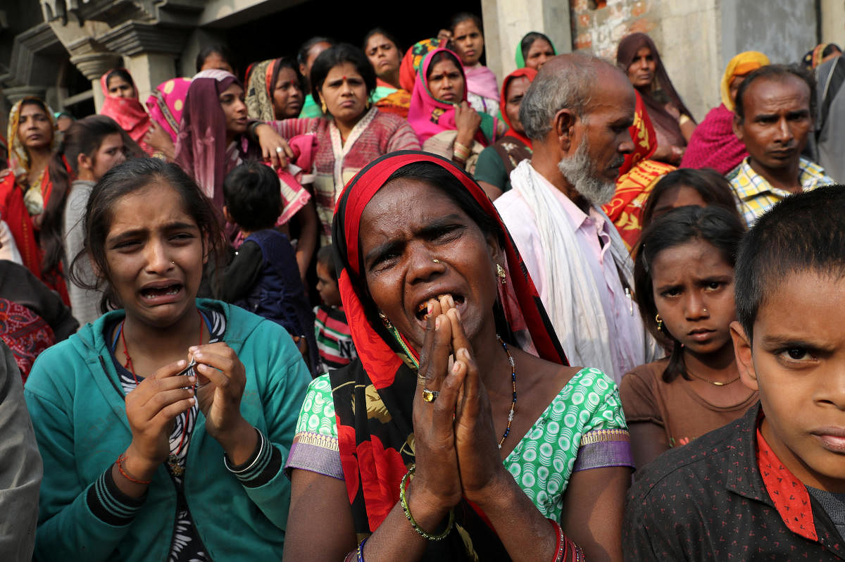 Relatives of the accused react as they demand a Central Bureau of Investigation probe into the rape of a 23-year-old victim, who died in a New Delhi hospital on Friday, after she was set on fire by a gang of men. (Reuters Photo)