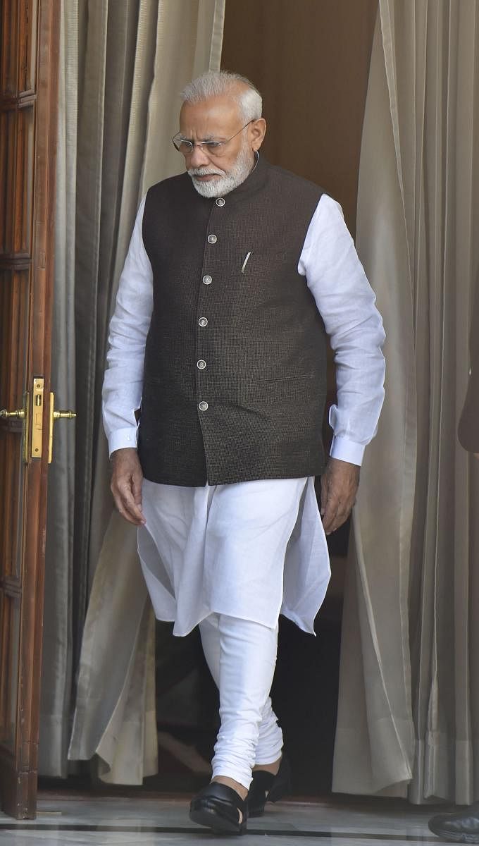 Prime Minister Narendra Modi arrives at Hyderabad House for a meeting with King Carl XVI Gustaf of Sweden. (PTI Photo)