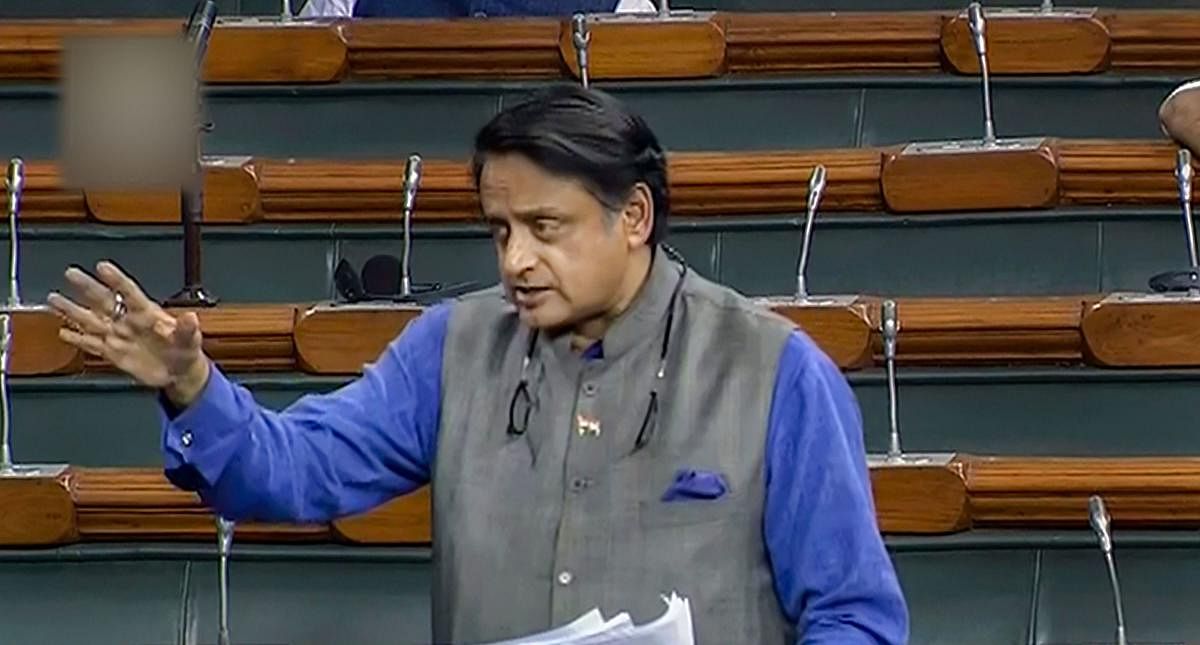 Congress member Shashi Tharoor speaks in the Lok Sabha. Photo by PTI.