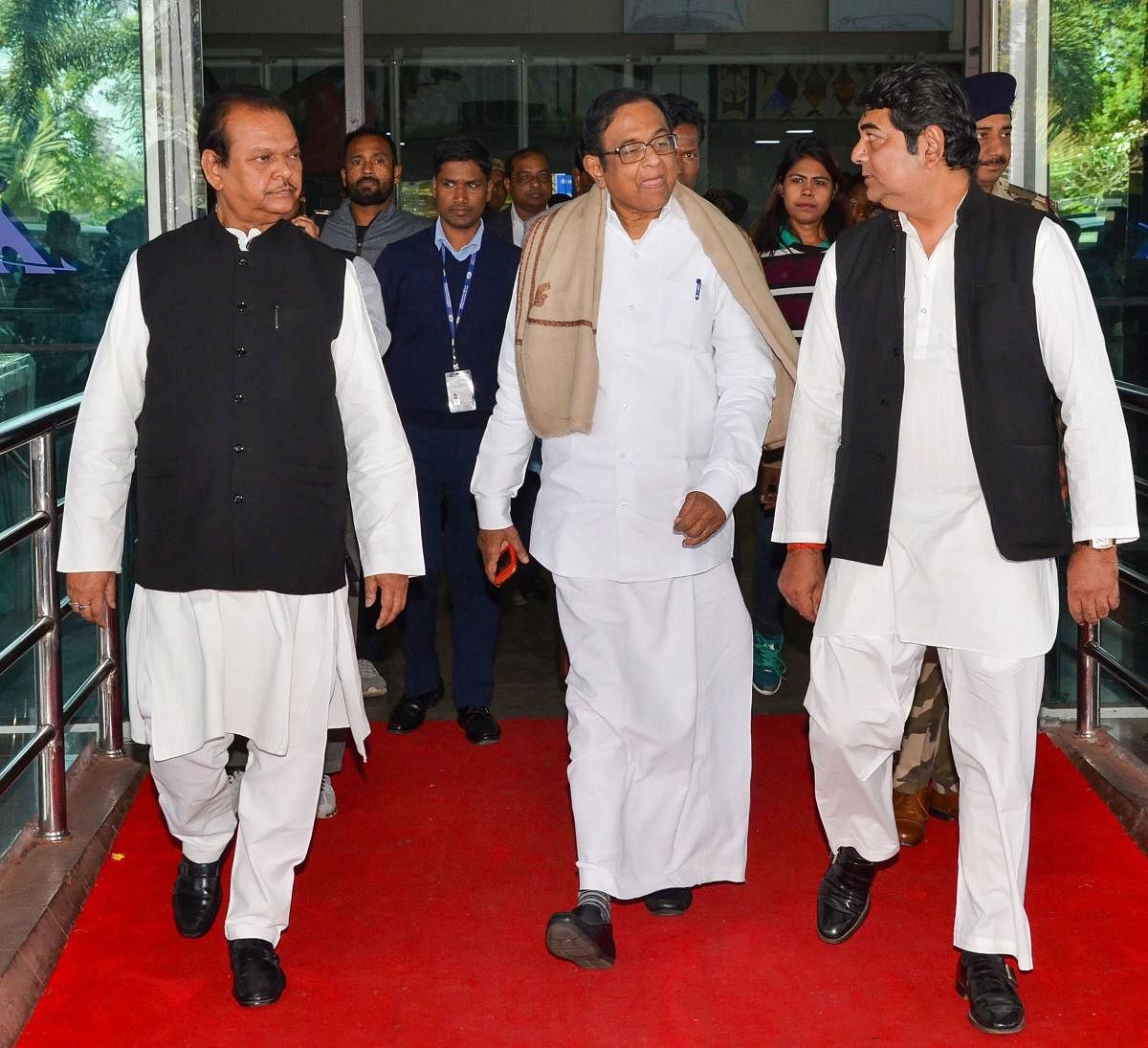 Ranchi: Senior Congress leader and former finance minister P Chidambaram is greets by party leaders on his arrival at Birsa Munda International Airport, in Ranchi, Friday, Dec. 6, 2019. (PTI Photo)(PTI12_6_2019_000058B)