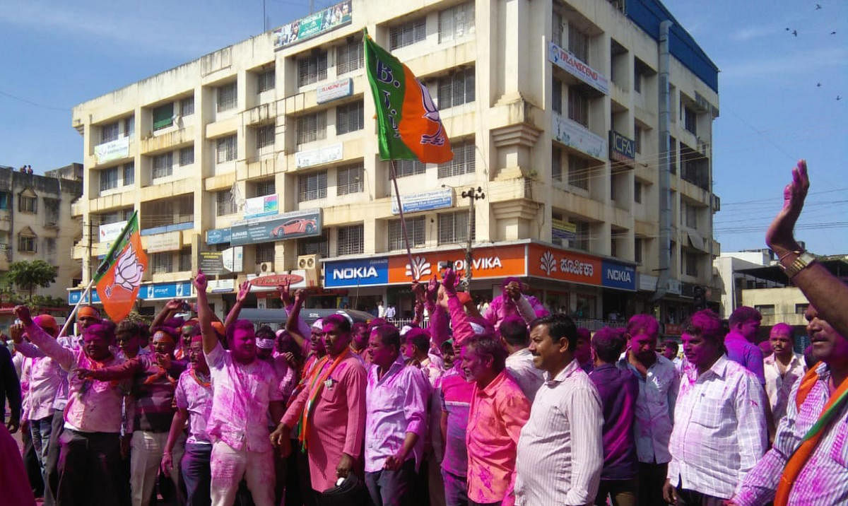 BJP workers celebrate the party's win in the bypoll to all three Assembly segments in Belagavi district - Gokak, Athani and Kagwad - at RPD Circle in Belagavi on Monday.