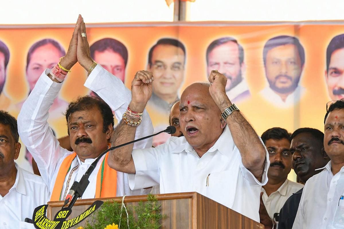 Mandya: Karnataka Chief Minister BS Yediyurappa addresses an election campaign rally in support of the BJP candidate for KR Pet Assembly bypoll Narayana Gowda, in Mandya district, Monday, Nov. 25, 2019. Photo/PTI